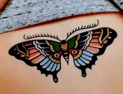 wide tattoo of butterfly
